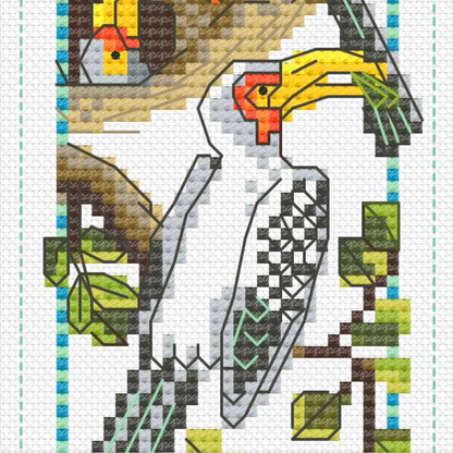 Close-up detail of Hornbill cross stitch bookmark pattern on Aida fabric by Golden Frog Stitches