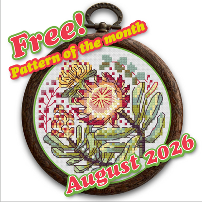 A circular framed cross-stitch pattern featuring a floral design with a prominent red and yellow protea, green leaves, and small yellow flowers. The piece is shown with promotional text reading 'Free! Pattern of the month' and 'August 2026' overlaid on the image.